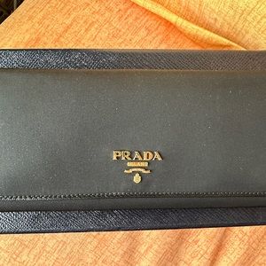Prada triangle flap Tessuto nylon Saffiano black continental wallet
